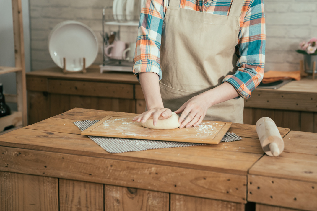 Female Hands Kneading Dough Making Bread